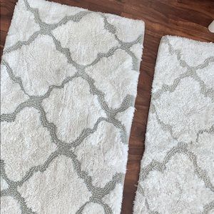 TWO FOR 25 ANTHROPLOGIE RUGS
